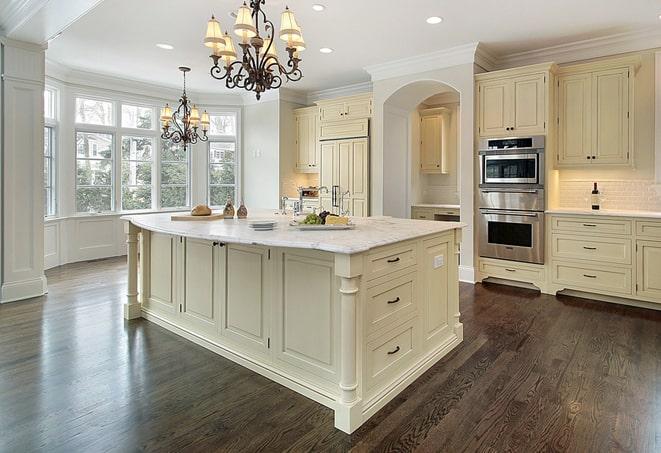 a modern kitchen with newly installed laminate floor in Pendleton IN